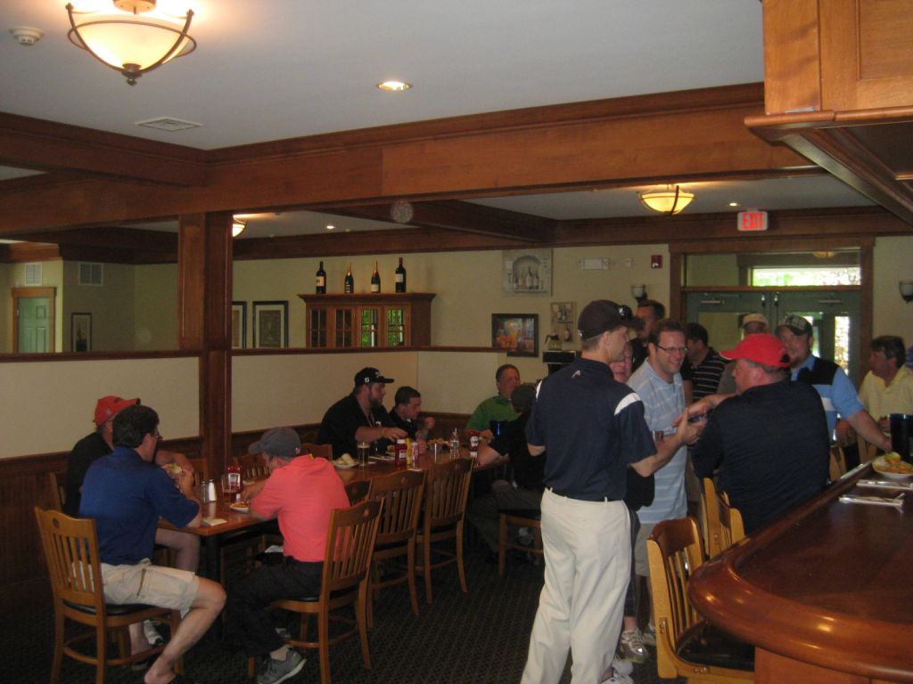 Guests enjoy themselves in The Grille at Butternut Farm Golf Club in Stow, Massachusetts