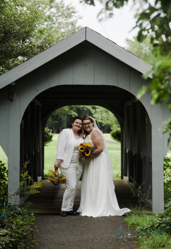 view image of a couple on the course in a new tab